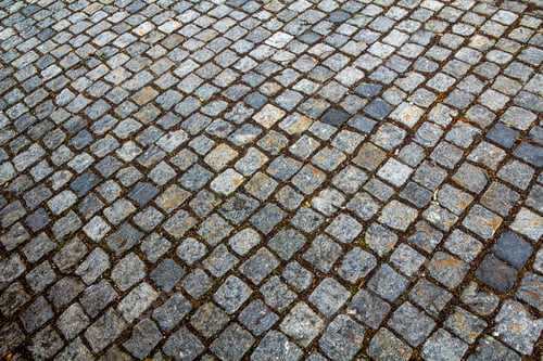 Preview: Abstract pattern of squared old-fashioned simple rough gray concrete street cobblestone