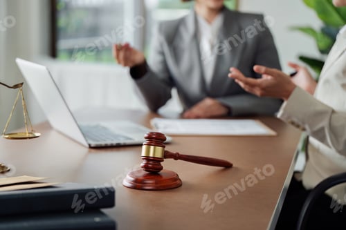 Preview: law and justice is represented by a mallet gavel of the judge, scales of justice, and books