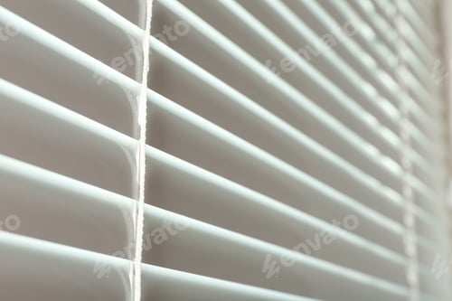 Preview: Closed modern white window blinds, closeup view