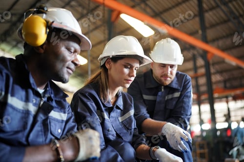 Preview: Professional heavy industry worker at factory. Business industry backgroud.