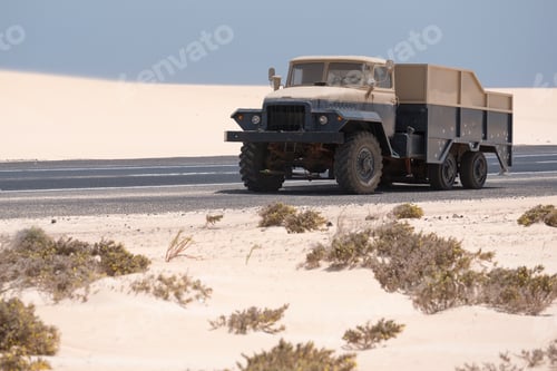 Preview: Truck on desert road daytime