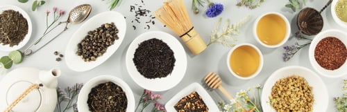 Preview: assortment of dry tea in white ceramic bowls