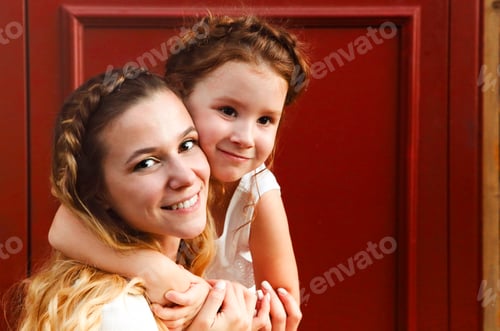 Preview: Woman and Child in Embracing in Home Setting