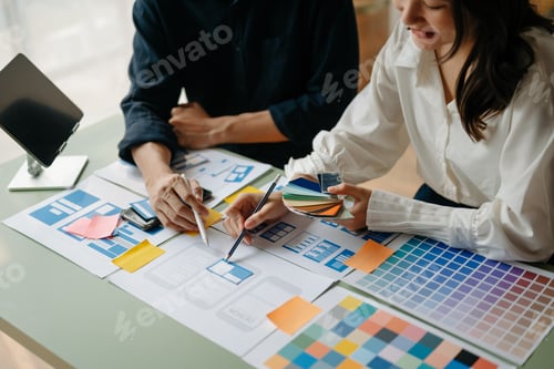 Preview: UX developer and ui designer brainstorming about mobile app interface wireframe design