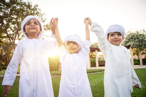 Preview: children playing together in Dubai in the park.