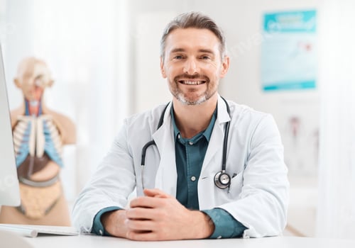 Preview: Superheroes wear stethoscopes. Portrait of a mature doctor working in a medical office.