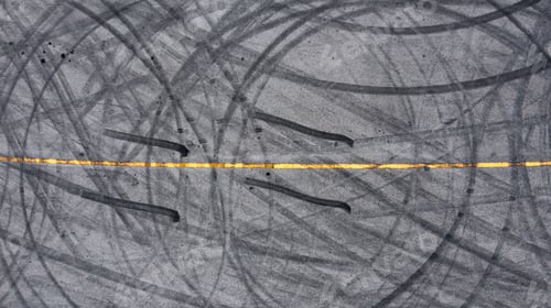 Preview: Aerial view tire track mark on asphalt tarmac road race track texture and background.
