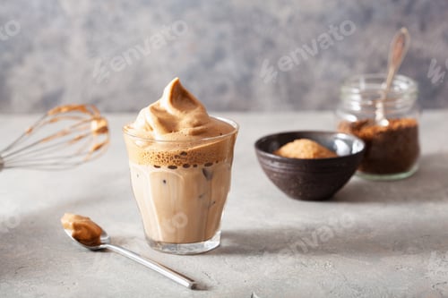 Preview: dalgona coffee in glass. trendy Instant coffee whipped with sugar and hot water
