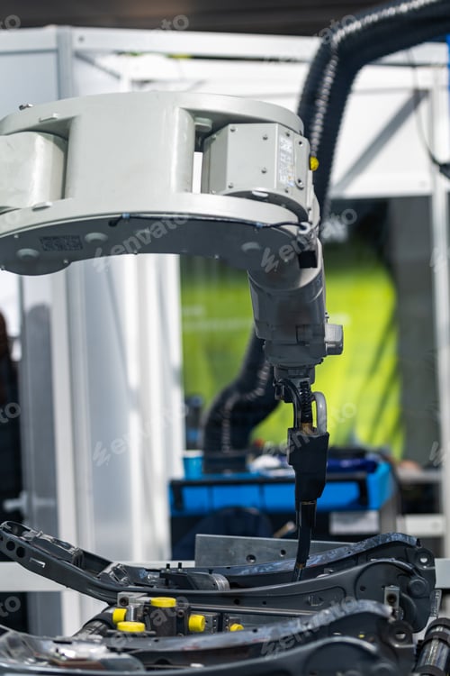 Preview: Robotic arm welding system in a manufacturing production plant