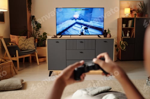 Preview: Enjoying Evening Playing Video Game in Cozy Living Room