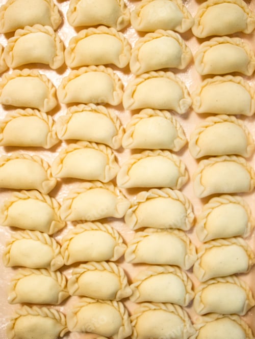 Preview: dumplings or ravioli on a tray, homemade food, raw, dough, kitchen