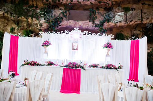 Preview: Amazing wedding table in pink style with flowers and foods