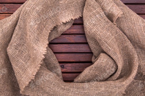 Preview: Burlap on wooden background