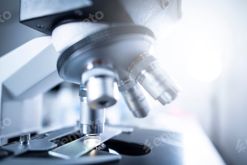 Preview: Close-up shot of microscope with metal lens at laboratory, Modern medical laboratory equipment