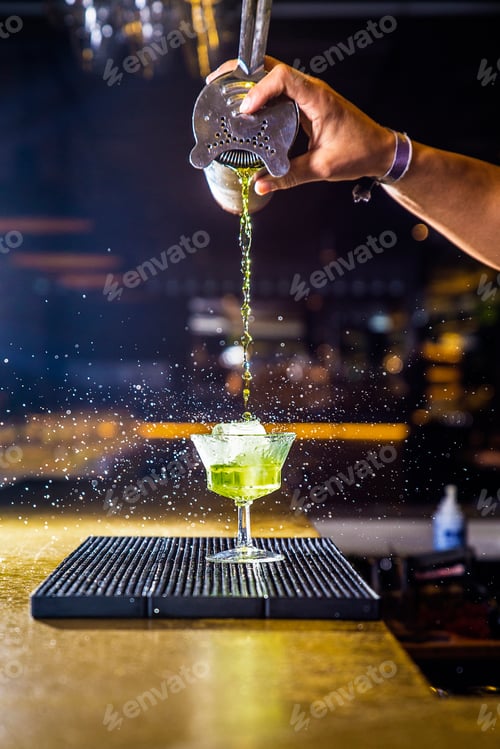 Preview: Barman is making cocktail at night club
