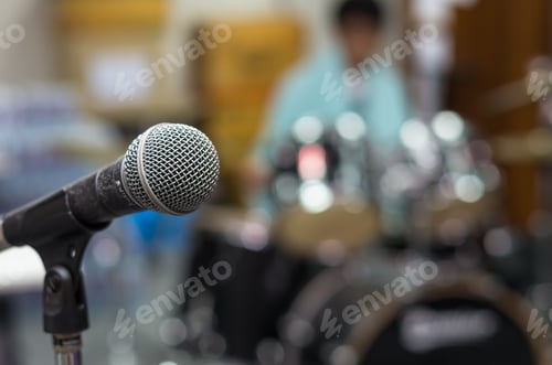 Preview: Close up of microphone on musician blurred background