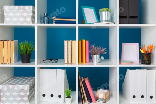 Preview: Stacks of supplies and paperwork in the office and bookshelves