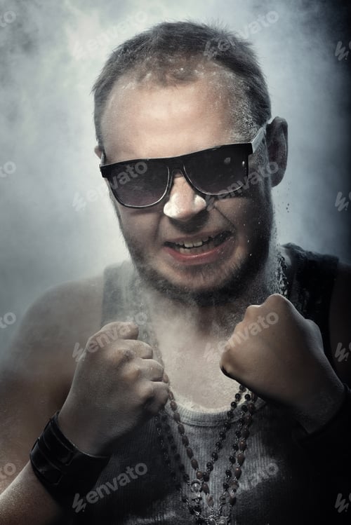 Preview: Brutal angry man covered by the dust