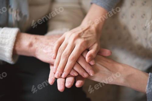 Preview: Elderly woman holding hands with daughter