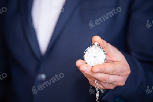 Preview: Businessman with clock in time concept