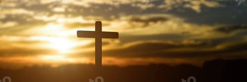 Preview: Silhouette of catholic cross at sunset background
