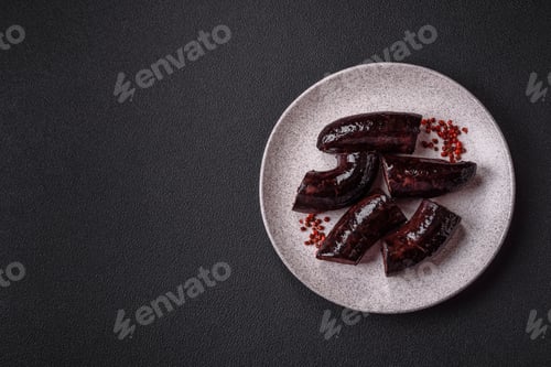 Preview: Delicious black blood sausage or black pudding with spices and herbs