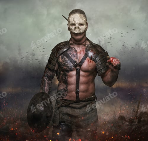 Preview: Male in the skull mask holds sword in the dust batterfield background.