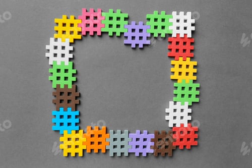 Preview: Multicolored puzzles on a gray background