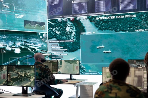 Preview: Army personnel monitoring surveillance imagery from satellite system