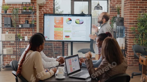 Preview: Business man talking to workmates about project planning and strategy