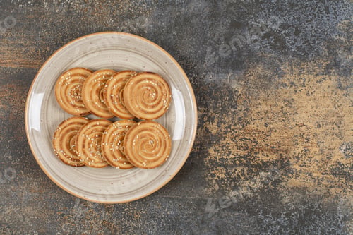 Preview: Tasty biscuits with sesame seeds on ceramic plate