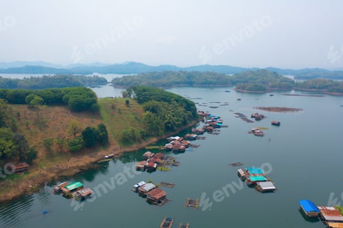 Preview: Aerial top view of houses in Mon village, Kanchanaburi, Thailand in urban city town in Asia