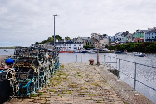 Preview: Fishing nets and traps on the jetty of a small fishing port.