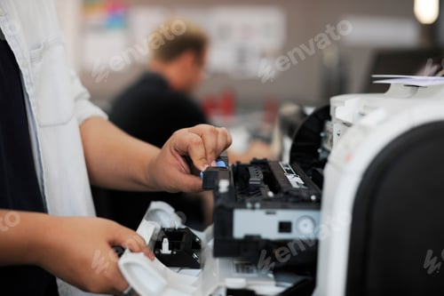 Preview: People Hands Opening Checking Printer in Office