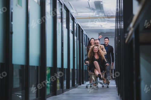 Preview: Successful teamwork businessman and woman are enjoy and happy with the clumsy chair together