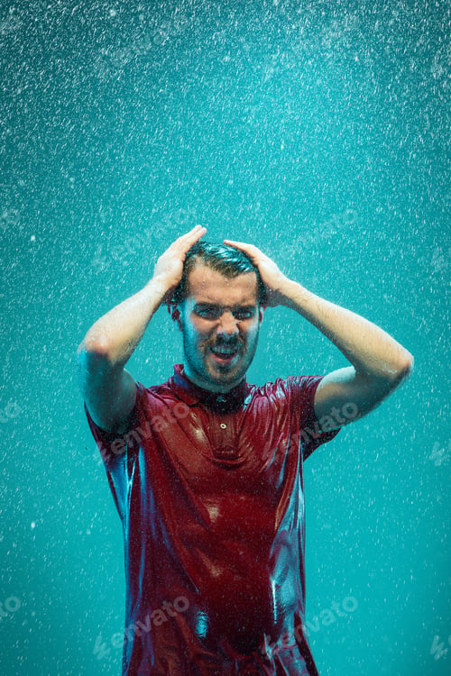 Preview: The portrait of young man in the rain