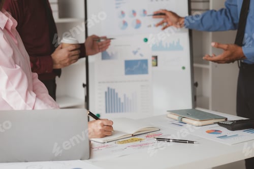 Preview: Company meeting room has businessmen and finance managers meeting together on business plan, they ar