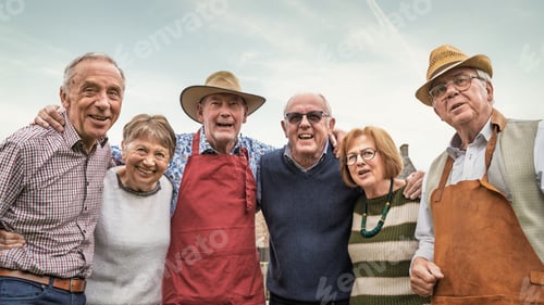 Preview: Senior friends smiling together outdoors showing friendship and community