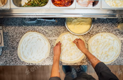 Preview: Top view chef cooking pizza. Catering kitchen work.