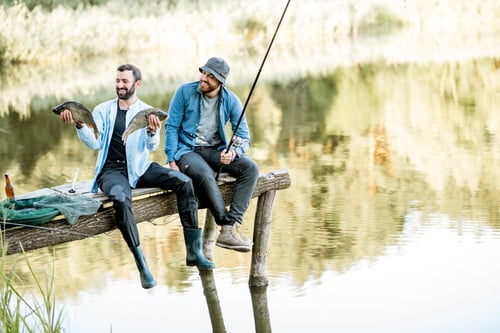 Preview: Fishermen with fish on the lake