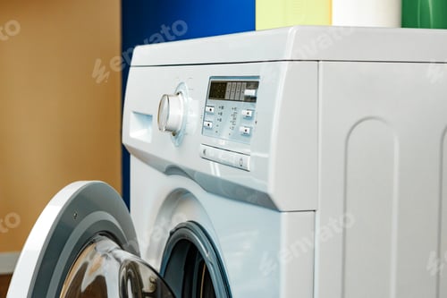 Preview: Close up of washing machine in bathroom