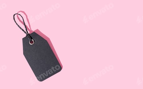 Preview: Black Tag on Pink Background with Copy Space