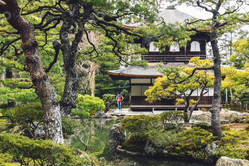 Preview: Small lonely woman figure in Ginkakuji Temple Silver Pavilion garden in Kyoto, Japan
