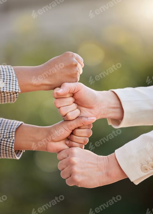 Preview: Shot of a group of unrecognizable businesspeople stacking their hands