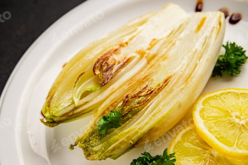 Preview: Chicory roasted or stewed fruit with sauce tasty snack fresh gourmet food background