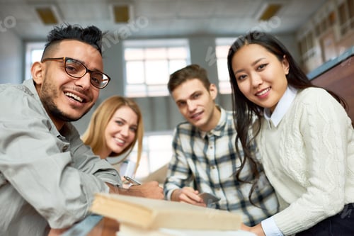 Preview: Smiling Young Adults Learning Together in College