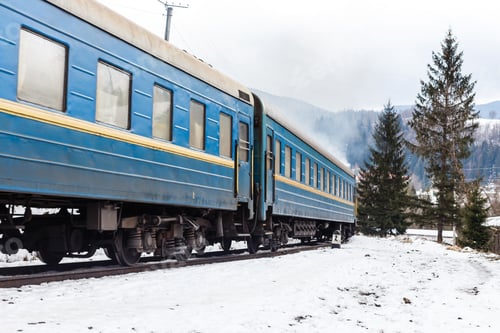 Preview: Old steam train in the snow in winter