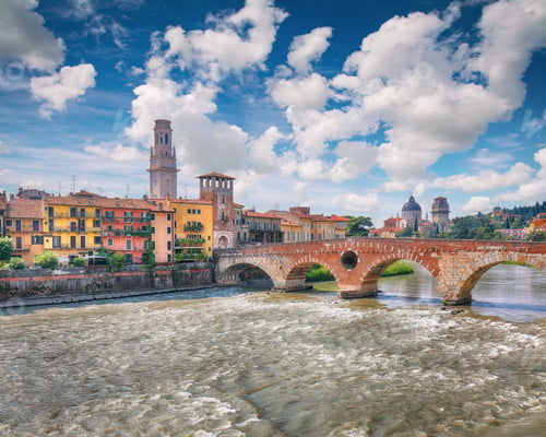 Preview: Amazing Verona cityscape view on the riverside with historical buildings ,bridges and tower