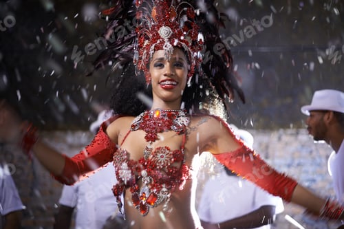 Preview: Cropped shot of a beautiful samba dancer performing in a carnival with her band