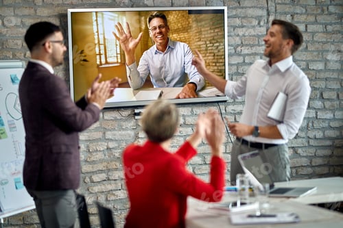 Preview: Group of business people having video conference from the office.